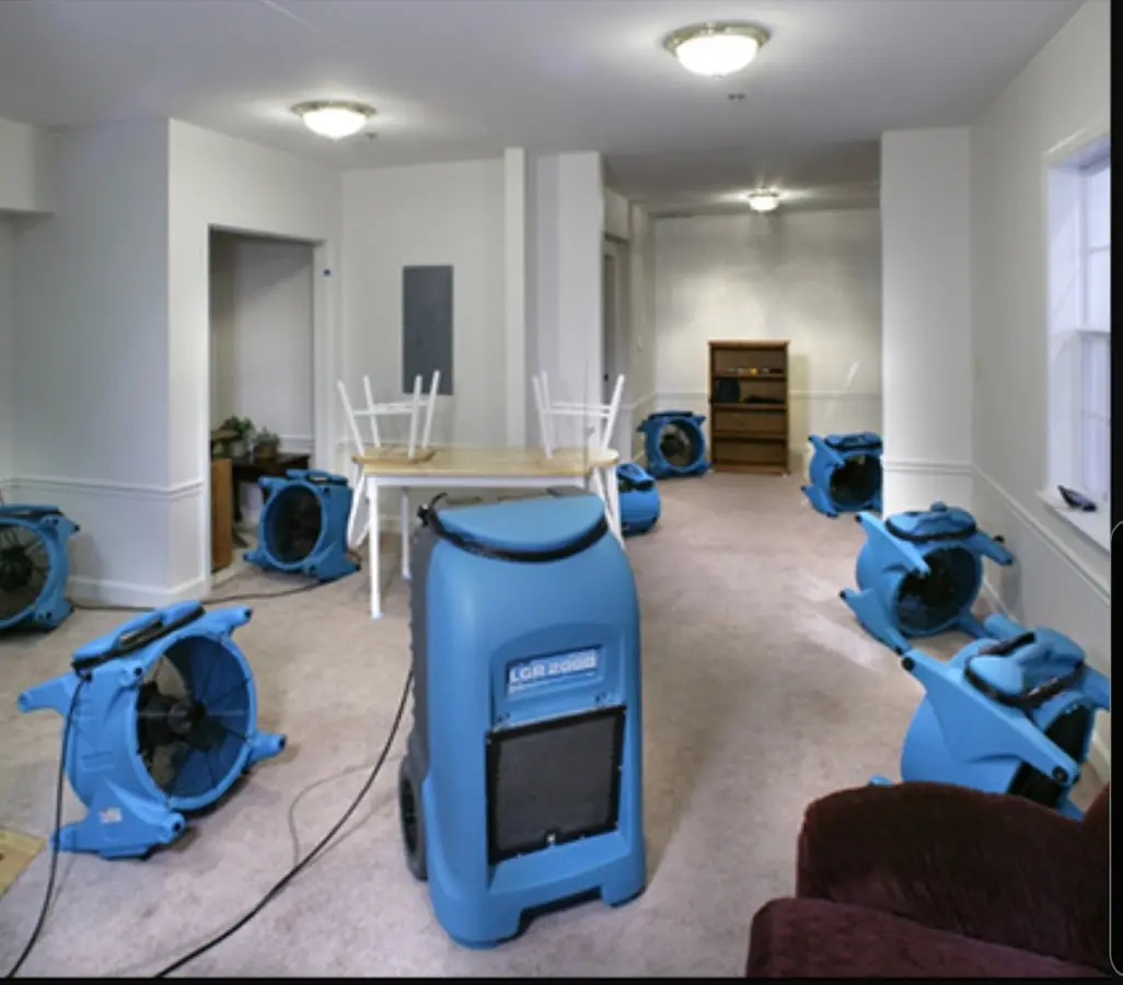 Air movers and dehumidifier setup for Water Damage Restoration in Montrose